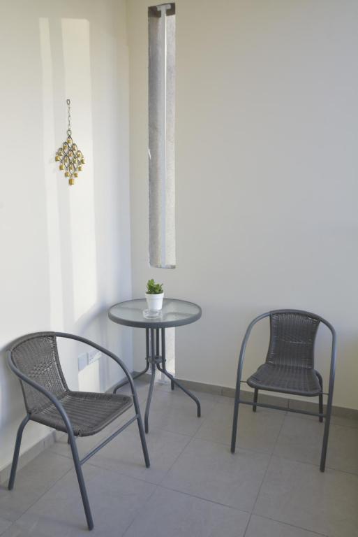 Private balcony with bistro table and chairs at the Fantasia Suite in central Nicosia