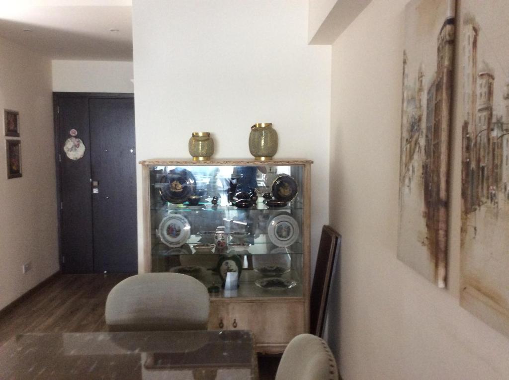 Vintage display cabinet near the entrance of the Vintage Suite in central Nicosia
