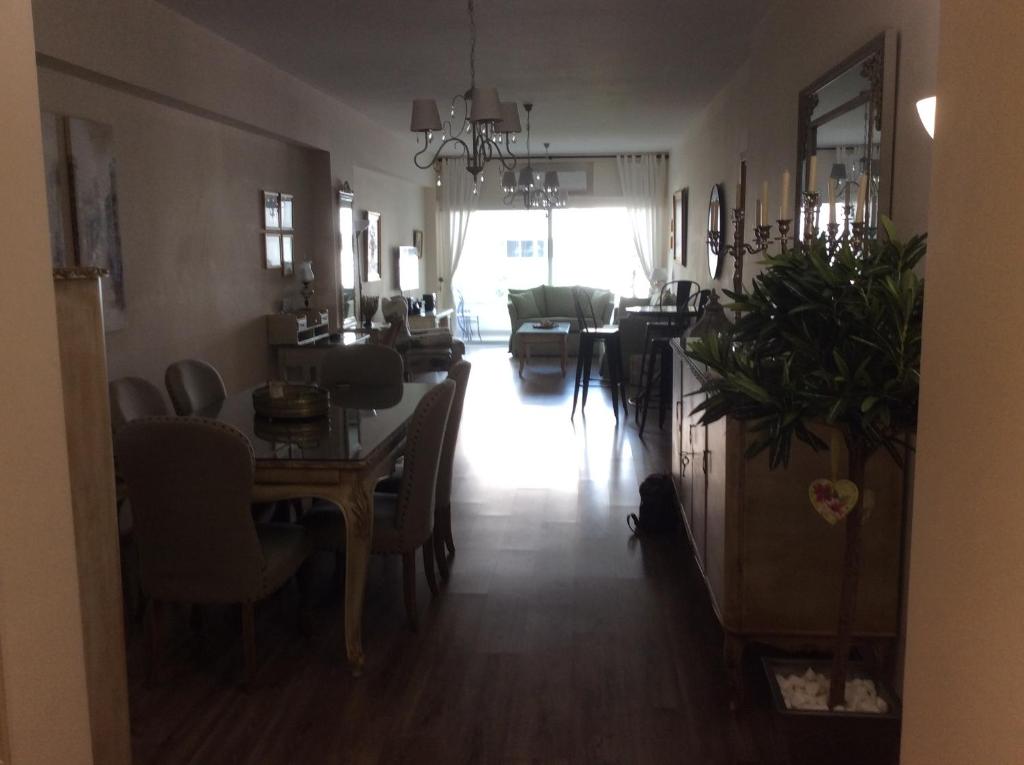 Long view from dining area through to the lounge at the Vintage Central Suite in central Nicosia