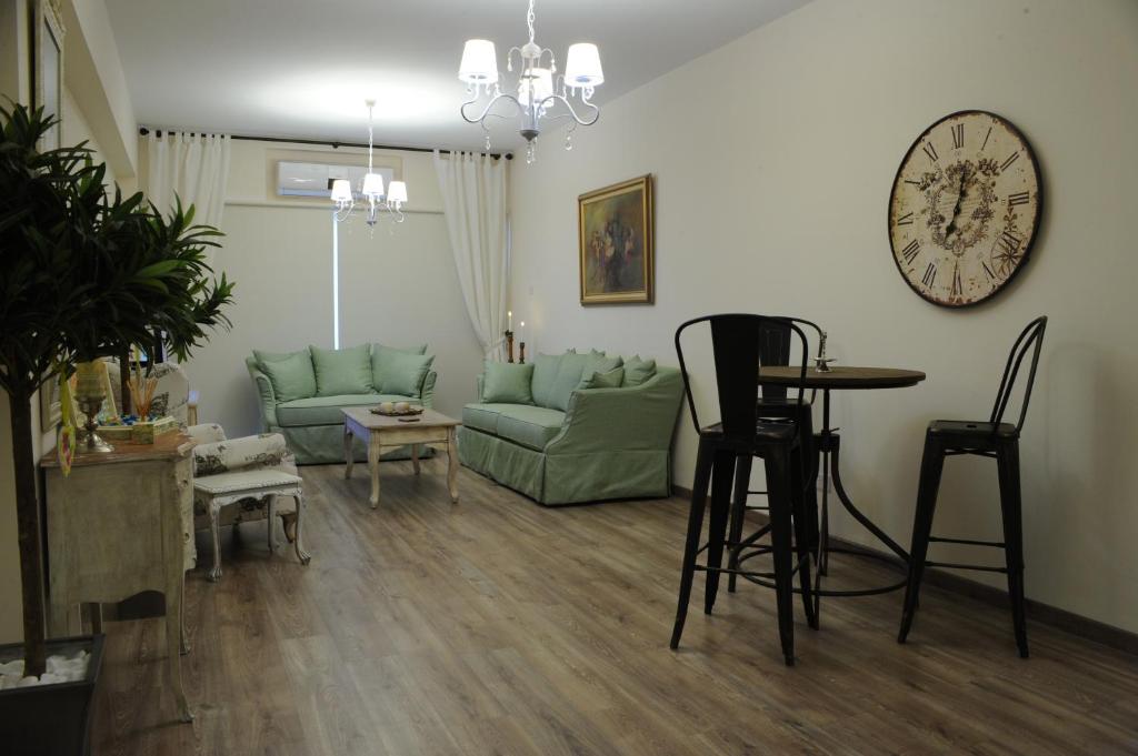 Vintage Suite living room with vintage furniture, chandelier and wood floors in central Nicosia Cyprus