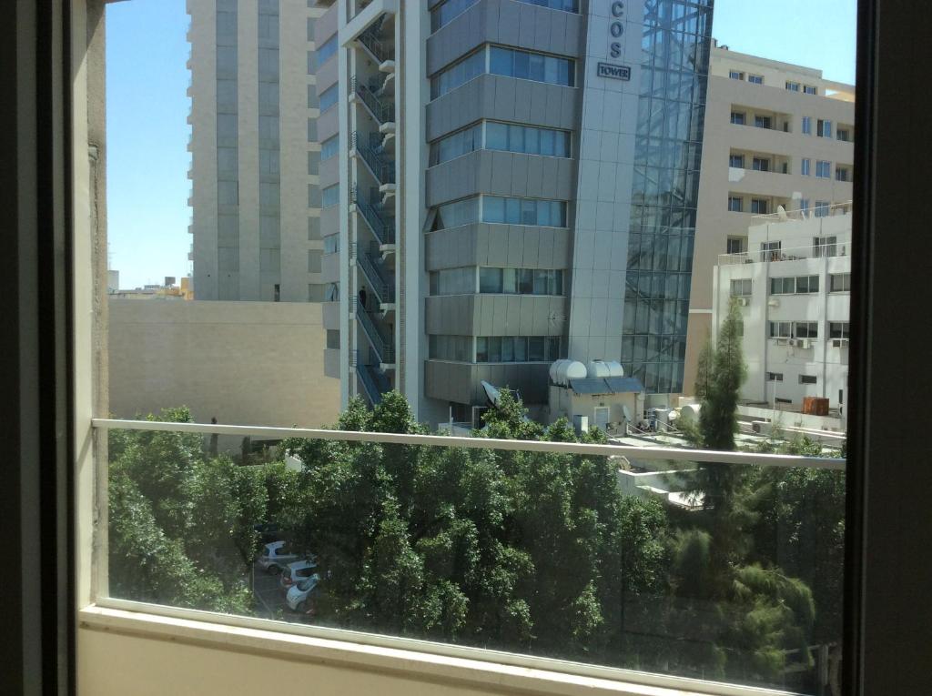 City view of central Nicosia high-rise buildings from the Fantasia Suite window